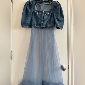 A jean dress with a puffy skirt